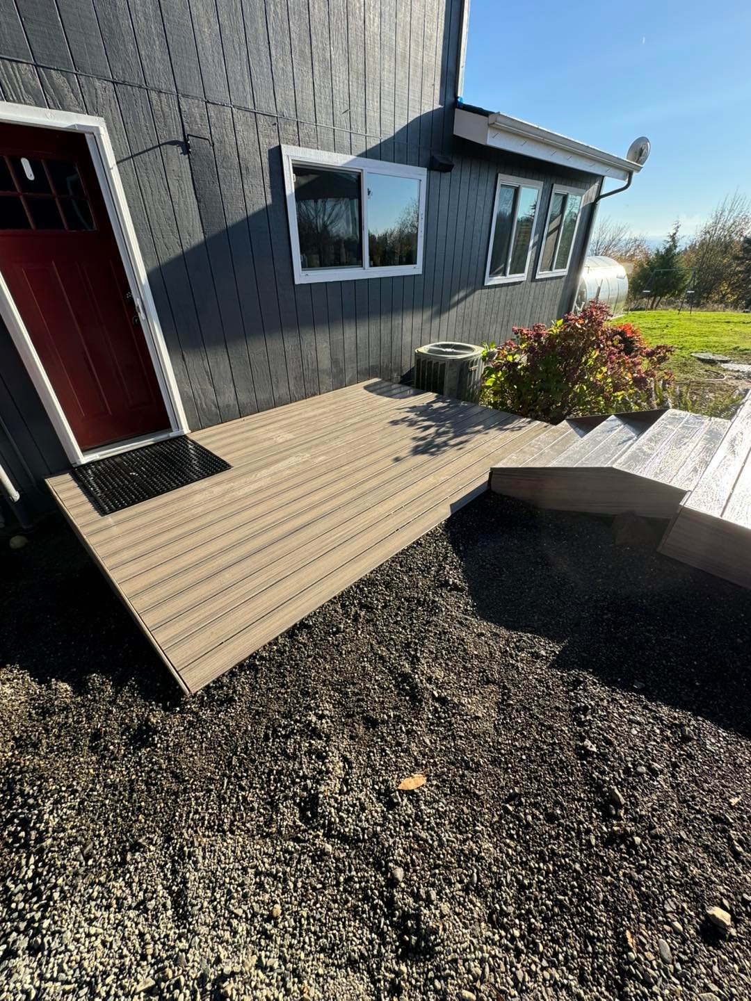 New composite deck and steps installed at a Longview, WA home by VC Contractor