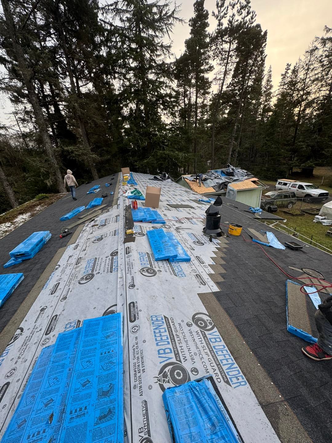VB Defender synthetic underlayment with slip-guard installed on a rural home re-roof in Longview, WA