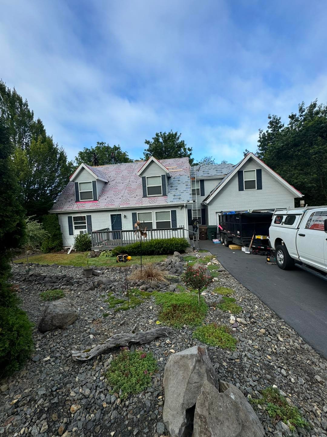 VC Contractor LLC truck and crew on a residential roof replacement in Longview, WA